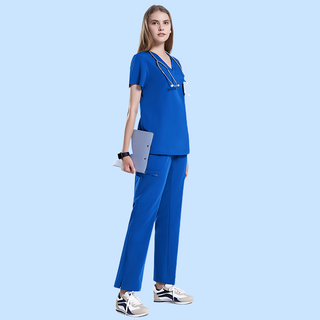 royal blue medical scrub uniform for women. Top with v-ring and pants with straight legs and many pockets. Foot slit design